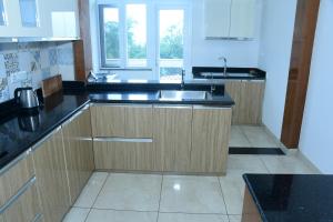 Køkken eller tekøkken på Homestay with Modern Amenities