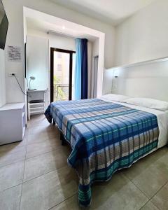 Postel nebo postele na pokoji v ubytování Hotel Ondina
