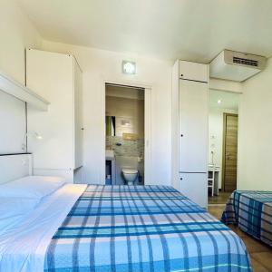 Postel nebo postele na pokoji v ubytování Hotel Ondina