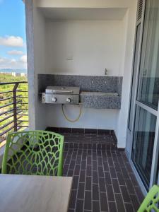 Balkón nebo terasa v ubytování Hermoso apartamento, con la comodidad de tu hogar!