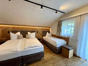 Postel nebo postele na pokoji v ubytování Appartement Hubner