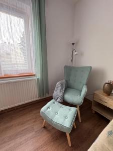 Posezení v ubytování Apartmán na Trávnicích