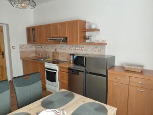 Kuchyň nebo kuchyňský kout v ubytování Apartmán na Trávnicích + 2 fotografie