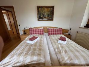 Postel nebo postele na pokoji v ubytování Ferienwohnung Cäcilia