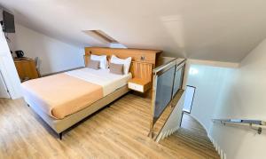 Postel nebo postele na pokoji v ubytování S A L - Beach Apartments Caniçal