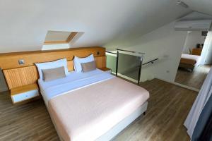 Postel nebo postele na pokoji v ubytování S A L - Beach Apartments Caniçal