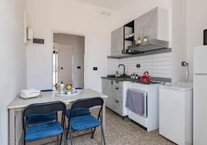 Køkken eller tekøkken på Brg dx - Attico terrazza vista panoramica Lungarni Pisani