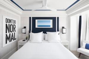 Postel nebo postele na pokoji v ubytování Hotel Mim Sotogrande Club Maritimo