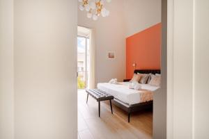 Postel nebo postele na pokoji v ubytování Anna CENTRAL Suites & Apartments + 32 fotografií