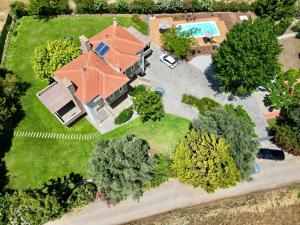 an overhead view of a house with an orange roof at Villa Polyxeni Magnolia 150m from the sea in Politiká
