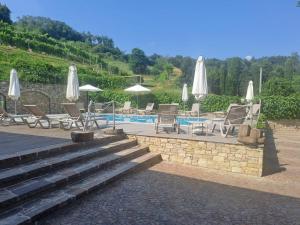 Πισίνα στο ή κοντά στο Locanda Al-Colle