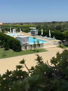 The swimming pool at or close to Le scuderie 1