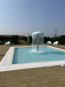 The swimming pool at or close to Le scuderie 1