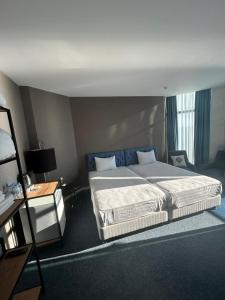 Letto o letti in una camera di Pano Hotel