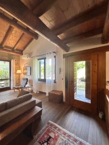 Llit o llits en una habitació de Bon Chalet Tirano - Bernina Express Apartment