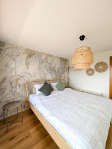 Imagen de la galería de Spacieux duplex avec accès direct au bains, en Saillon