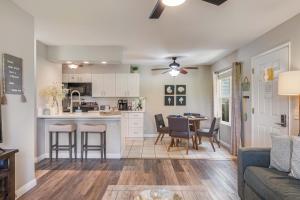 a kitchen and living room with a couch and a table at Fairway Terrace F-107 in Waikoloa Village +27 photos
