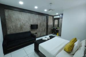 TV a/nebo společenská místnost v ubytování D-Green Hotels