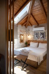 Ένα ή περισσότερα κρεβάτια σε δωμάτιο στο Plasis country suites 2