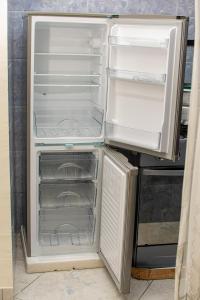 Kuchyň nebo kuchyňský kout v ubytování Appartement meublé Nsam