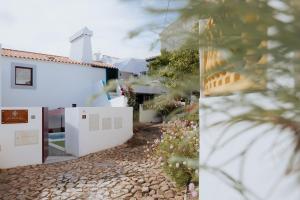 a view of the house from the garden at GinHouses Casa do Outeiro - Porto da Espada, Marvão in Marvão