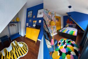 a bedroom with blue walls and a bed and a yellow cabinet at Hütte31 in Goslar