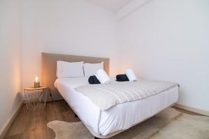 Postel nebo postele na pokoji v ubytování Cozy Apartment