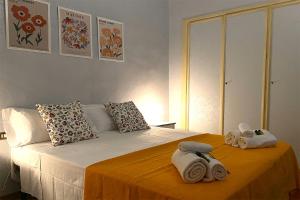 Postel nebo postele na pokoji v ubytování Albergo Diffuso Volterra