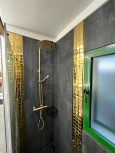 a bathroom with a shower with a glass door at 2-bedroom apartment in Playa del Inglés - El Dorado in Maspalomas