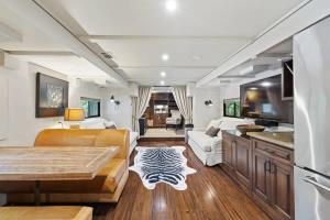 a living room with a couch and a table at 7744 Ranch Entire Resort in Austin