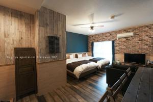 Postel nebo postele na pokoji v ubytování Prosper 5th bldg 302