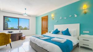 Postel nebo postele na pokoji v ubytování Eco Villa Tamarra