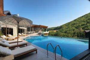 Bazén v ubytování Resort Ujevara e Drinit nebo v jeho okolí
