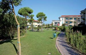 A garden outside Apartments in Caorle 24705