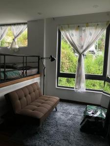 Postel nebo postele na pokoji v ubytování Hoshi DaLat House