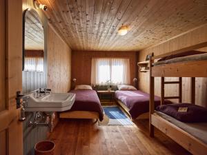 Ein Bett oder Betten in einem Zimmer der Unterkunft Sunneschy