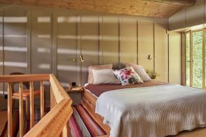 Ein Bett oder Betten in einem Zimmer der Unterkunft Sunneschy
