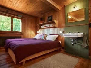 Ein Bett oder Betten in einem Zimmer der Unterkunft Sunneschy