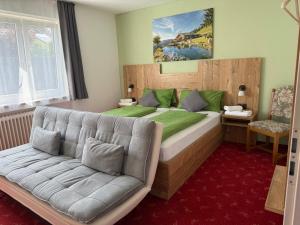 Posezení v ubytování Hotel Pension Schwansee