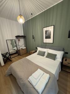 Postel nebo postele na pokoji v ubytování Casa Botanya - Rooms
