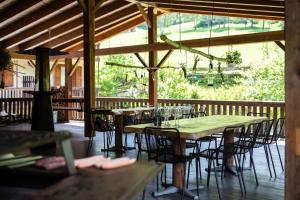 A restaurant or other place to eat at Holiday Homes in Tiarno di Sotto - Ledrosee 22703