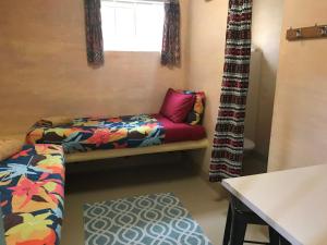 Posteľ alebo postele v izbe v ubytovaní The Cell Block Backpackers