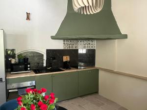 Dapur atau dapur kecil di Chambre dans maison à Saint Paul
