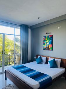 Postel nebo postele na pokoji v ubytování kandy hill villa + 37 fotografií