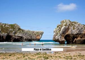 a group of people in the water at a beach at Apartalux San Pedro Ático de Luna in San Pedro del Pinatar