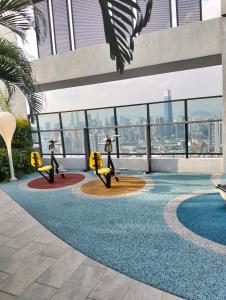 a view of a building with a swimming pool at Homestay at Trion KL in Kuala Lumpur