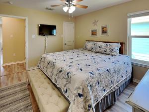 Postel nebo postele na pokoji v ubytování Gulf Coast Getaway + 9 fotografií