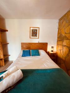 Postel nebo postele na pokoji v ubytování Gaia Guest House