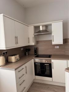 Η κουζίνα ή μικρή κουζίνα στο Grantham House +5 φωτογραφίες