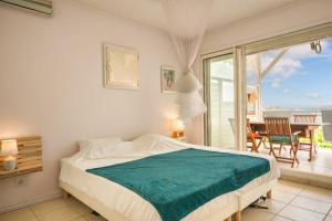 Postel nebo postele na pokoji v ubytování Appartement Côté Plage